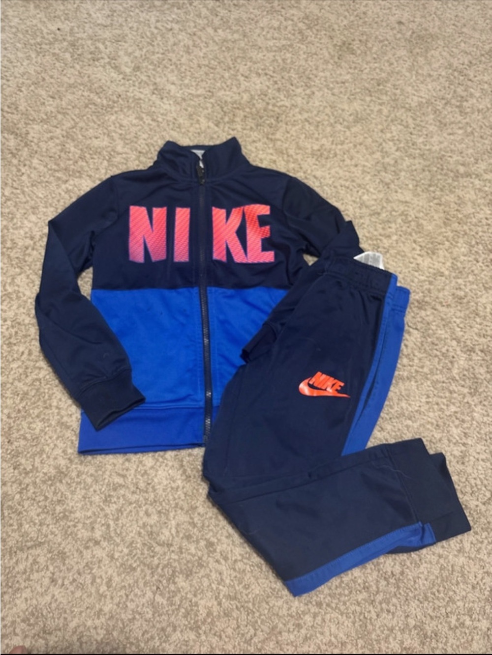 Nike Kids Navy Blue and Bright Blue Tracksuit with Pink Logo